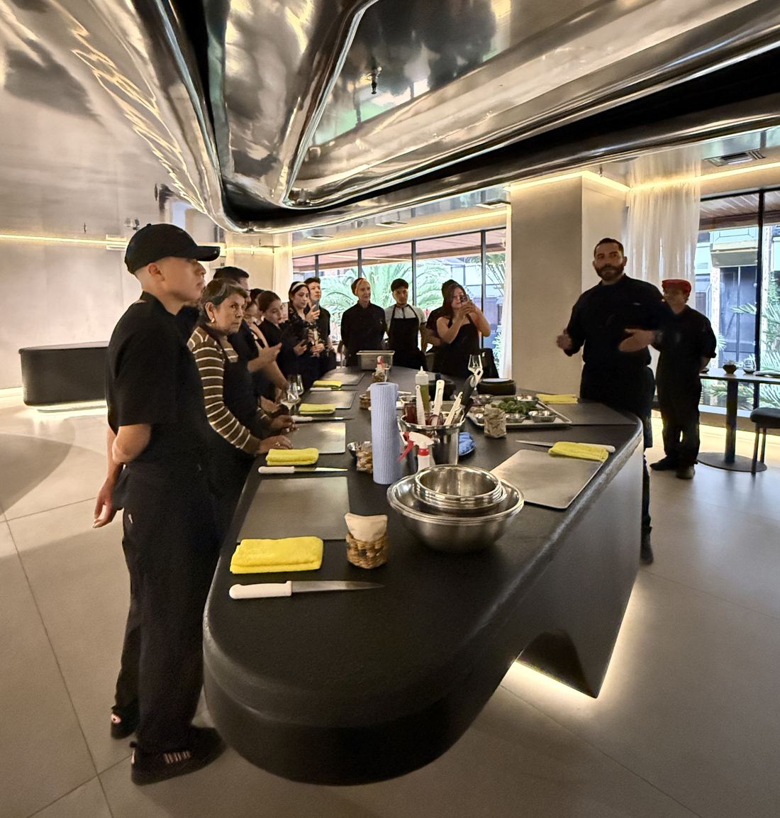 Chef Rodrigo Pacheco teaching a hands-on kitchen class
