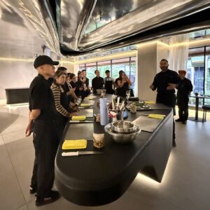 Chef Rodrigo Pacheco teaching a hands-on kitchen class